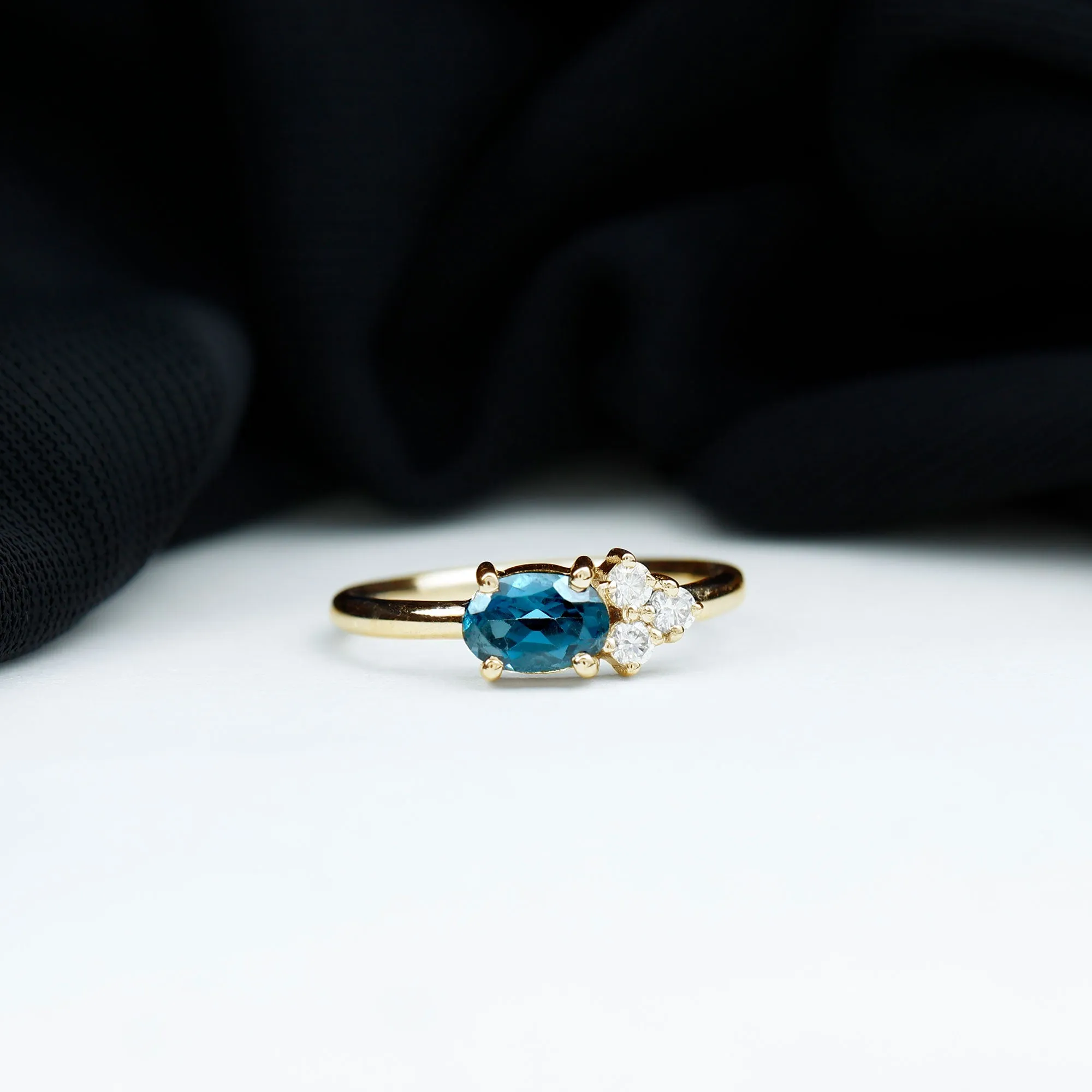 1/2 CT Oval Cut London Blue Topaz Promise Ring with Diamond Trio