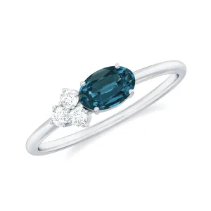 1/2 CT Oval Cut London Blue Topaz Promise Ring with Diamond Trio