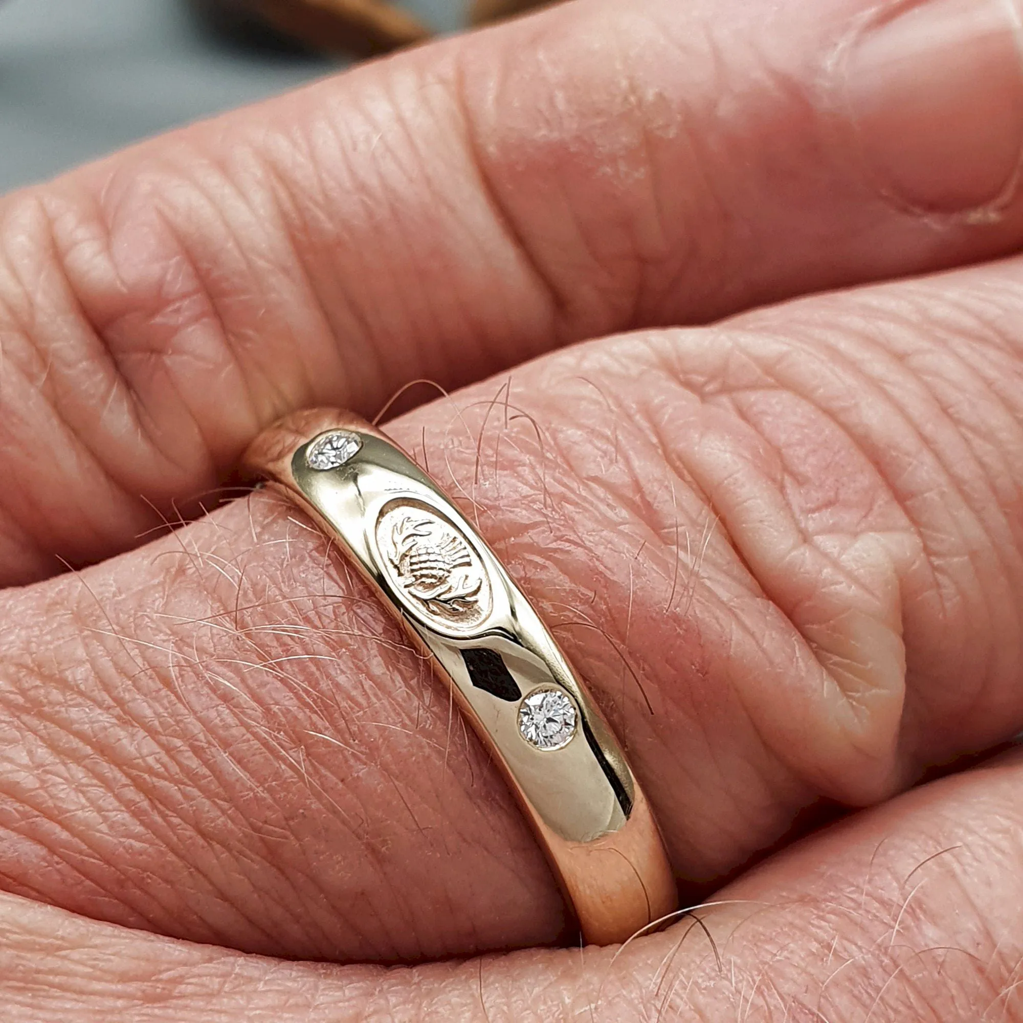 Scottish Thistle diamond set yellow gold narrow band.